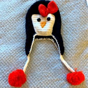 Adorable penguin winter hat for girls.